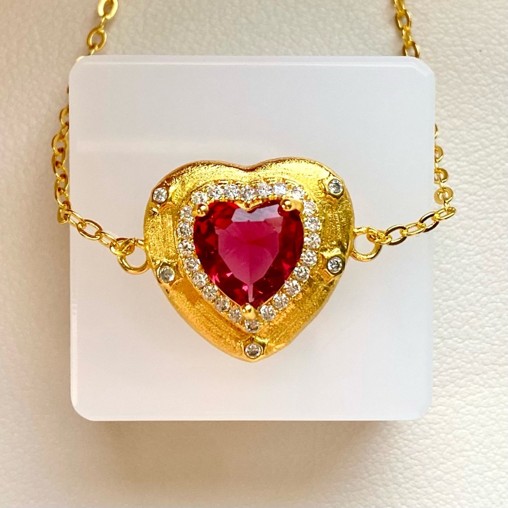 Gold Heart Bracelet with Red Heart Gem